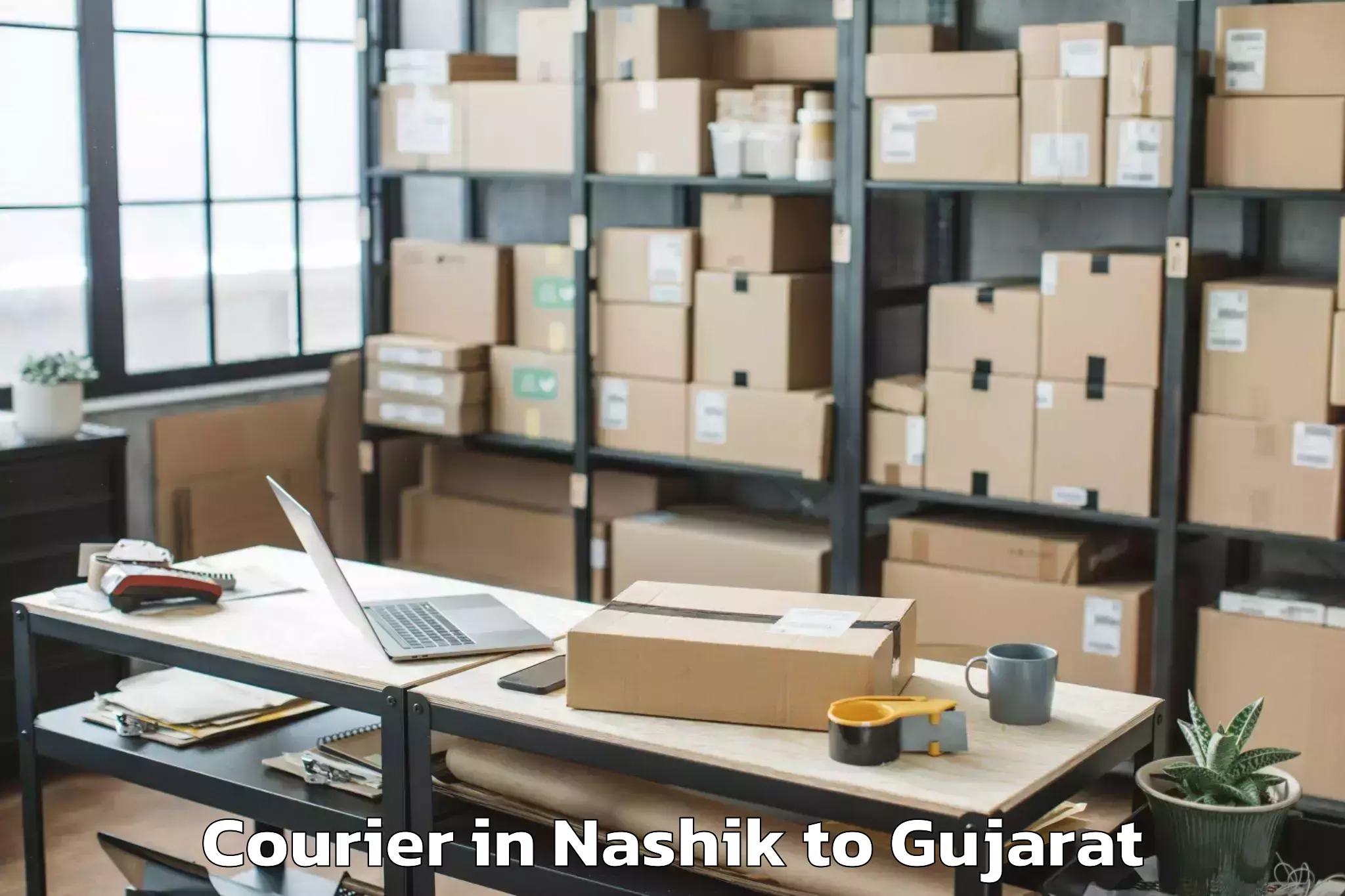 Book Nashik to Kalavad Courier